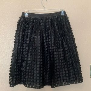 Large black skirt with circle detailing!
